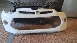 Toyota Passo 2015 Front Bumper (Comes With Lower Grill)