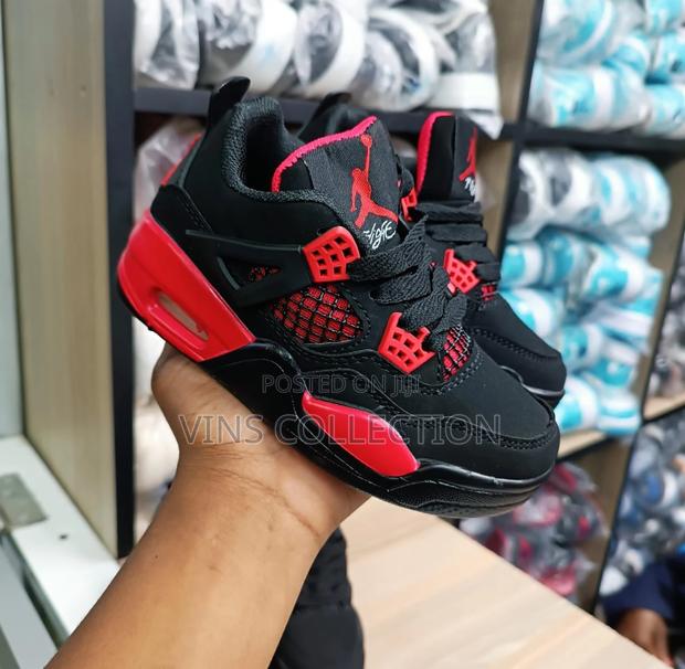 Kids Jordan 4 Sneakers