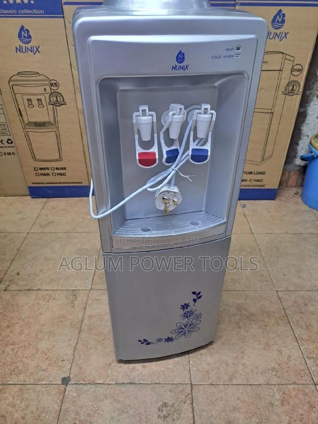 Water Dispenser Grey in Color Hot, Cold and Grey.