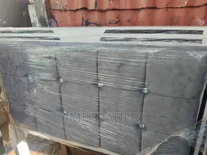 Grey Tufted Bed