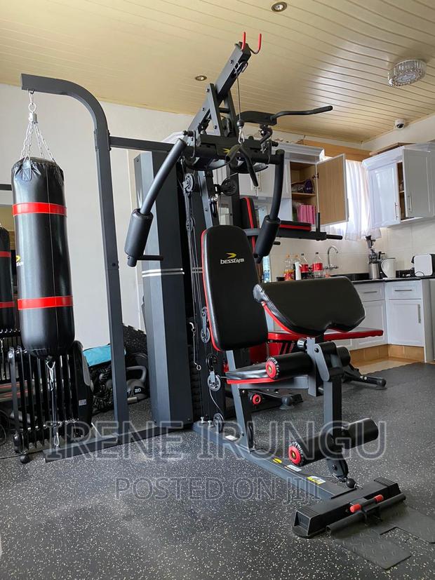 3 Station Multi Gym With a Punching Bag