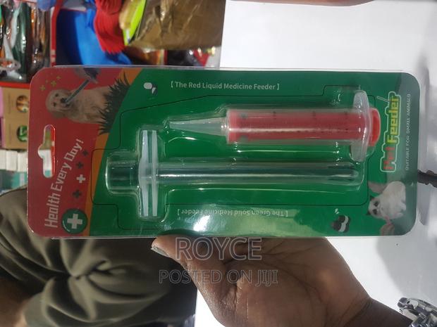 The Red Liquid Medicine Feeder - main view