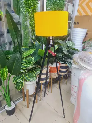Tripod Floor Standing Lamp With a Mustard Yellow Lampshade