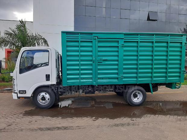 Isuzu NMR 2023 White - thumbnail 3