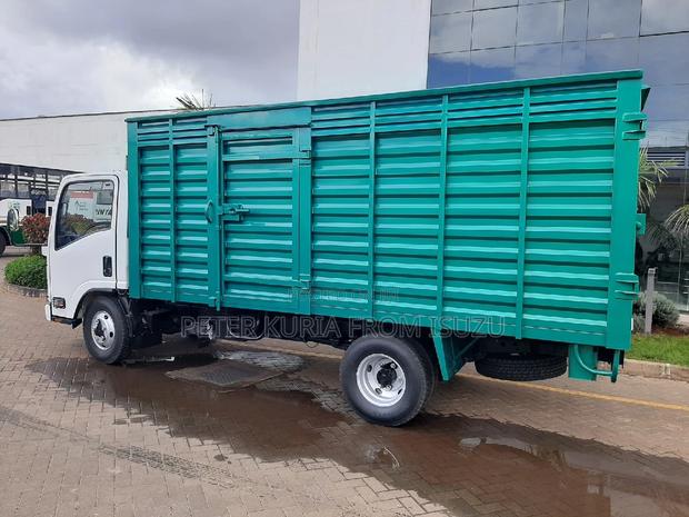 Isuzu NMR 2023 White - thumbnail 9