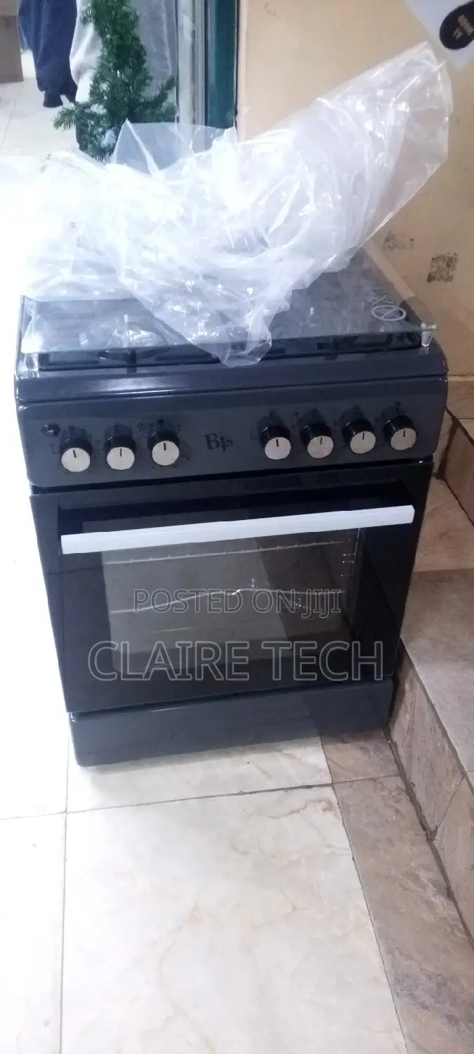 Cooker , BJ'S 60 by 60 ,3 Burner and 1 Hot Plate