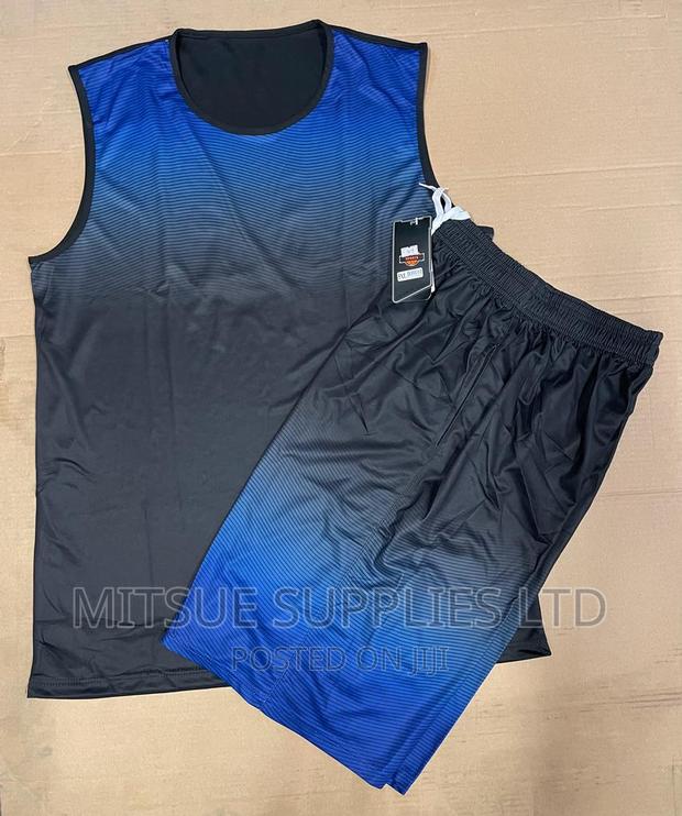A Set of 12 Pairs Basketball Uniforms for Team Blue White