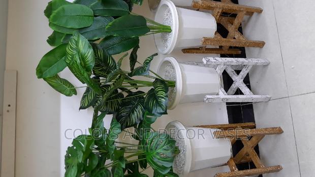 Artificial Plant, Stand and Plastic Vase With Pebble Stones