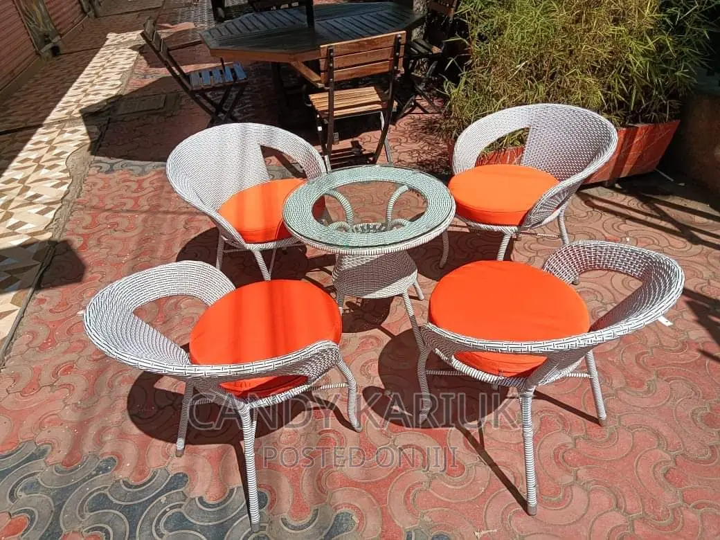 Spacious White 4 Seater Balcony Set With Orange Cushions