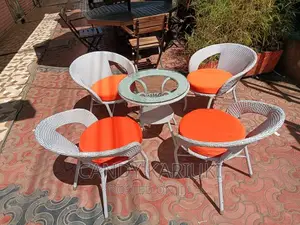 Spacious White 4 Seater Balcony Set With Orange Cushions
