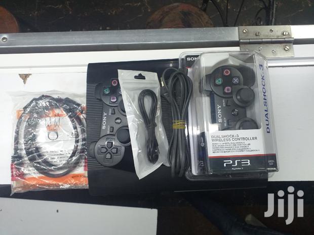 Playstation 3 With 13 Games - thumbnail 2