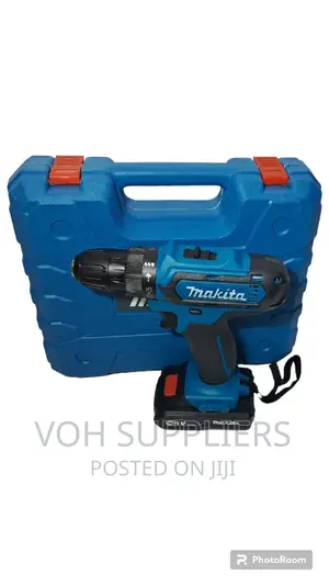 Cordless Drill With Two 26V Lithium Batteries .