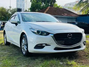 2016 Mazda Axela in Off-White: Minimum Two Options