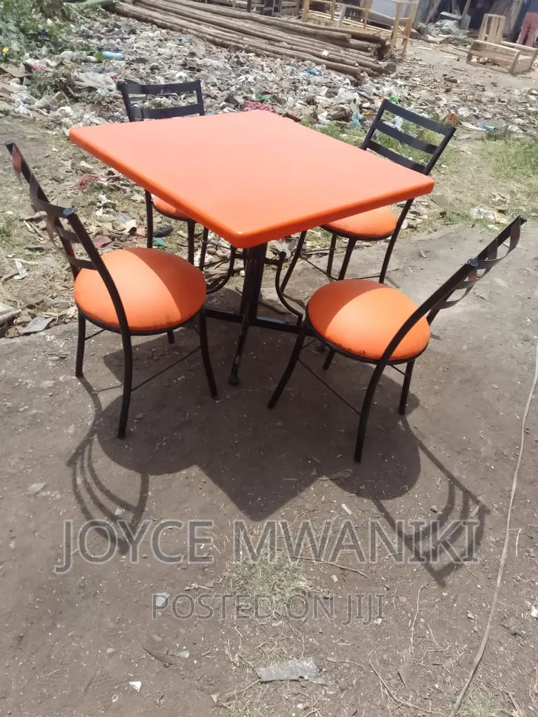 Restaurant Set, of Orange Flat Chairs.