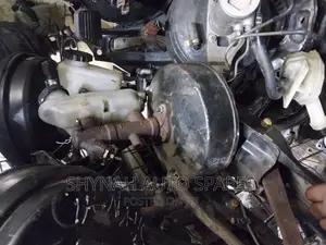 Brake Booster and Master Cylinder Complete Mazda 323