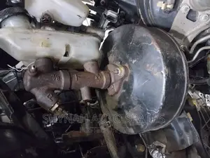 Brake Booster and Master Cylinder Complete Mazda 323