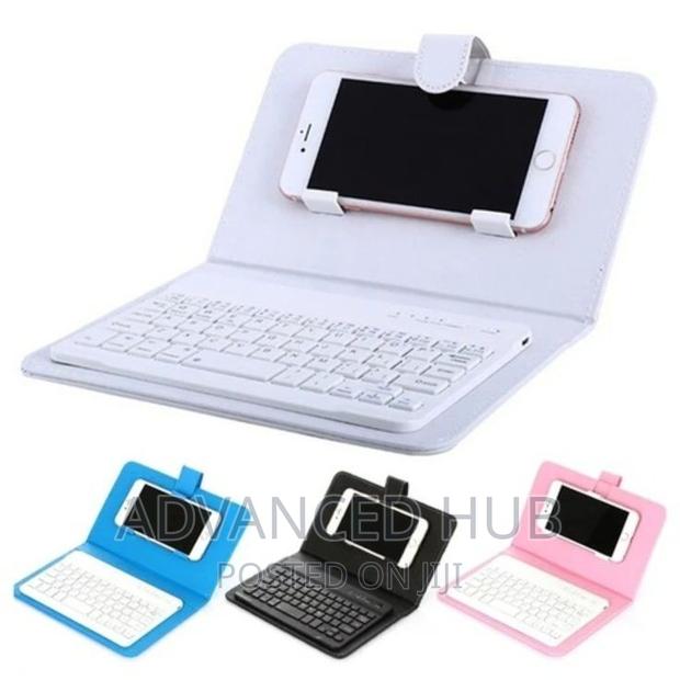 Multifunctional Bluetooth Keyboard With Leather Case Pouch - thumbnail 2