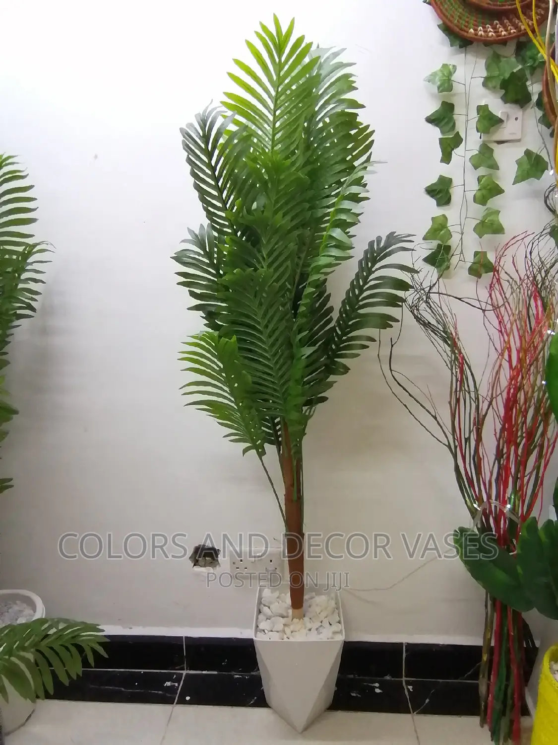 1.5m Palm Tree and Hard Plastic Vase on Offer