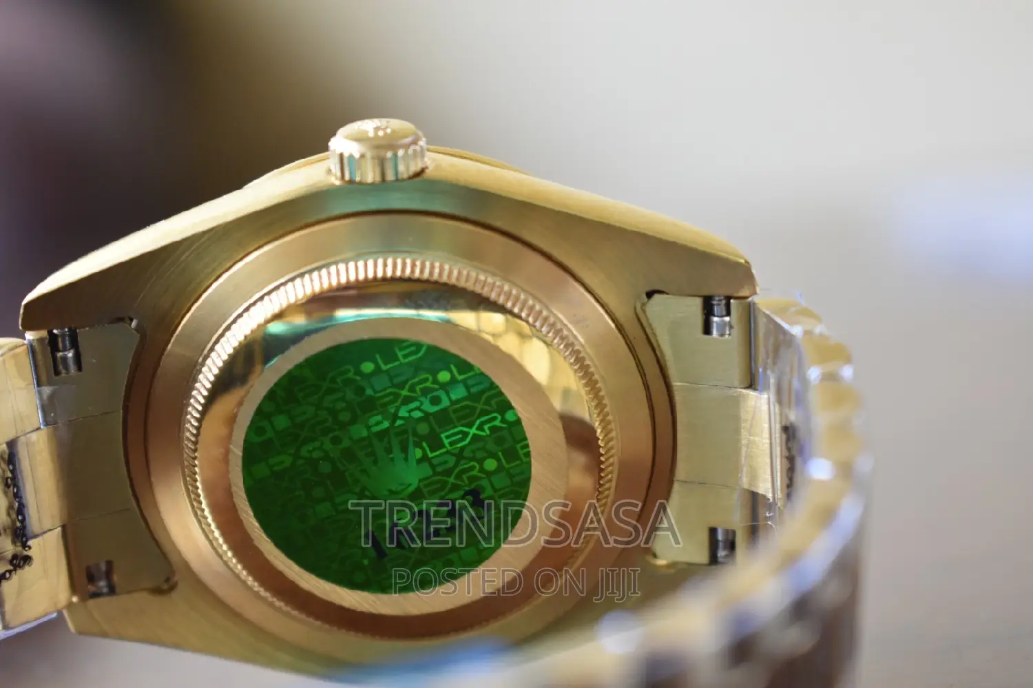 Rolex Day and Date Green Dial Yellow Gold Roman Numbers
