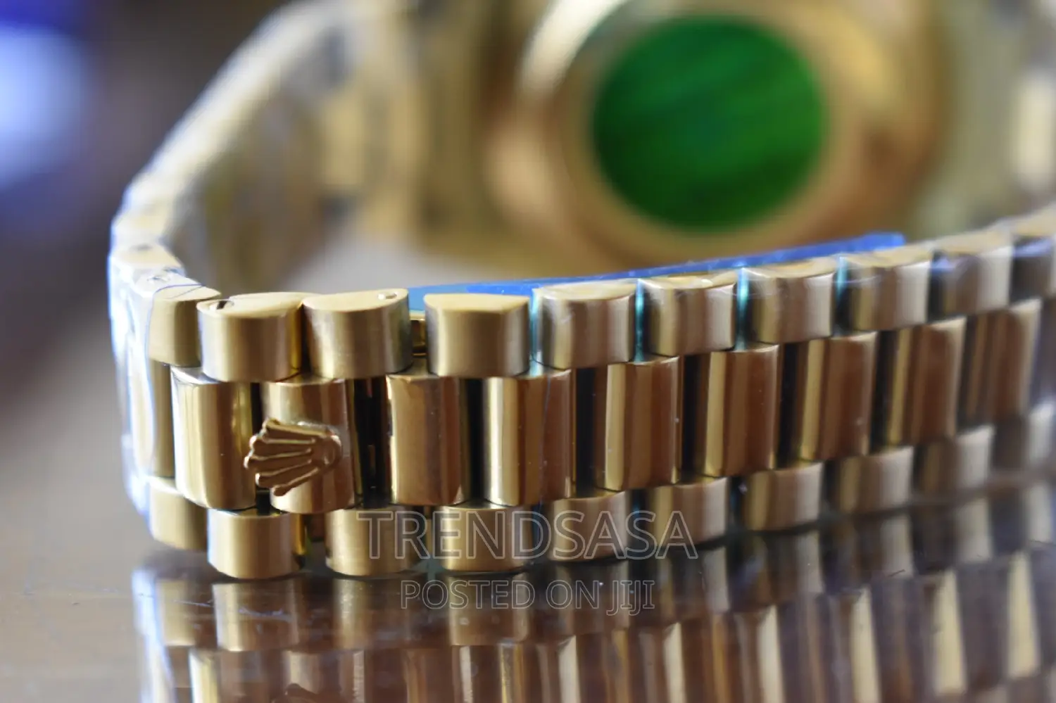 Rolex Day and Date Green Dial Yellow Gold Roman Numbers