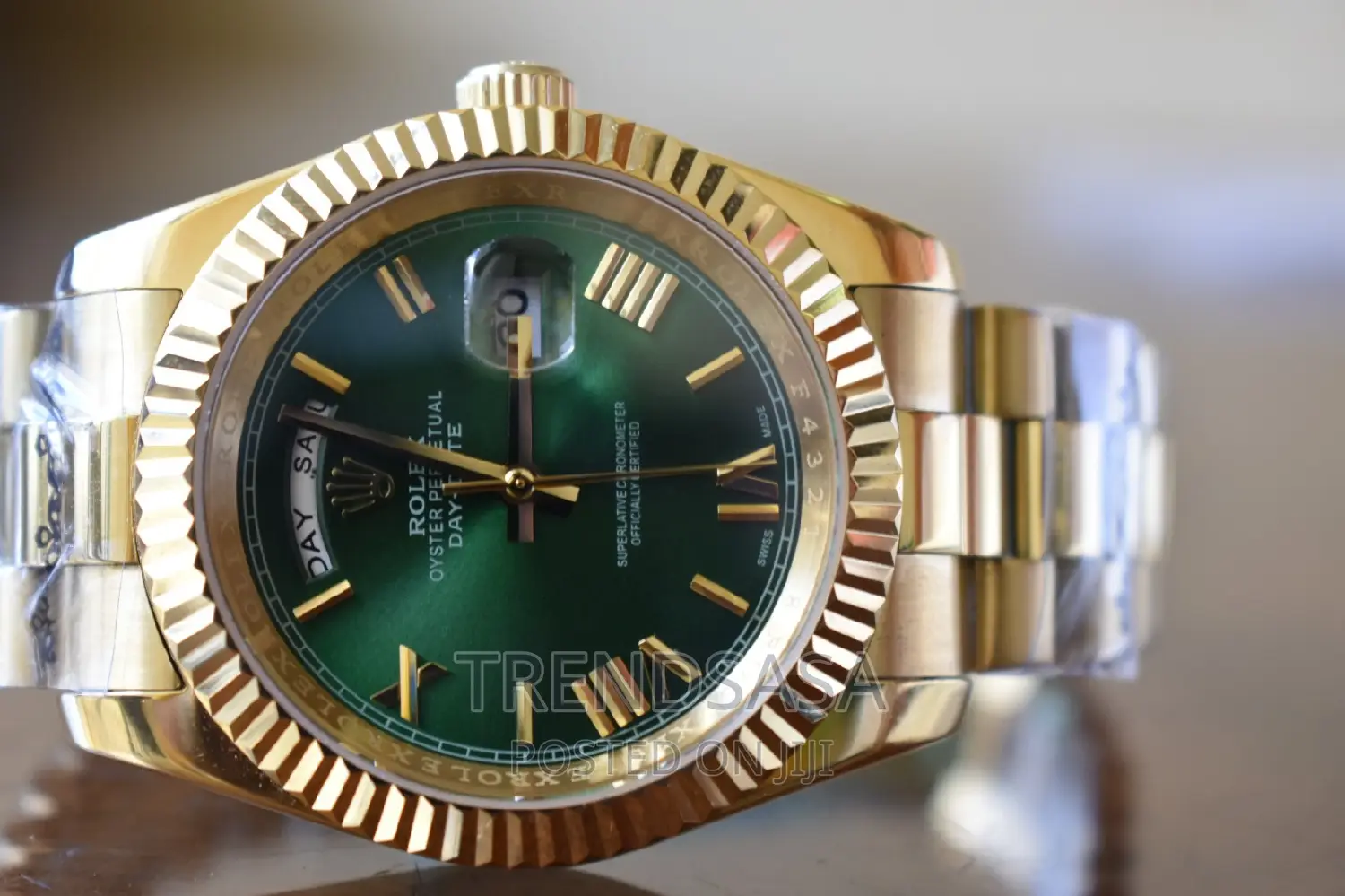 Rolex Day and Date Green Dial Yellow Gold Roman Numbers