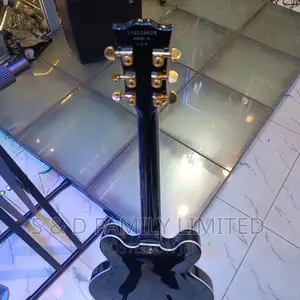 Black Gibson Les Paul Electric Guitar
