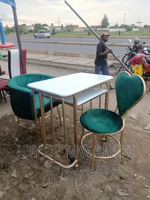 Manicure Set, Green Seats and Marble Table.