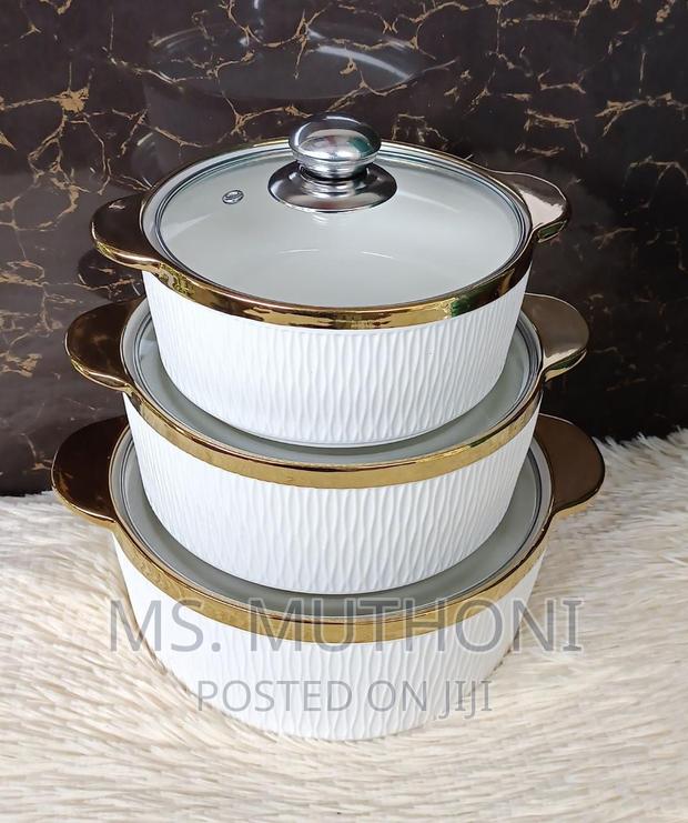 A Set of 3 Gold Rimmed Serving Bowls*