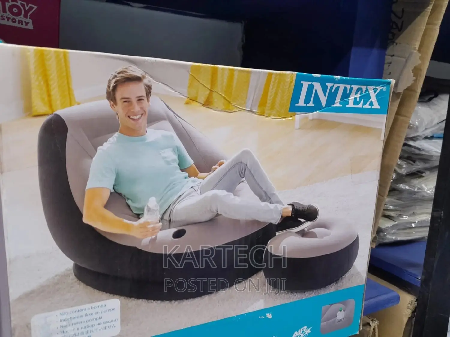 Inflatable Seat With Foot Rest and a Pump