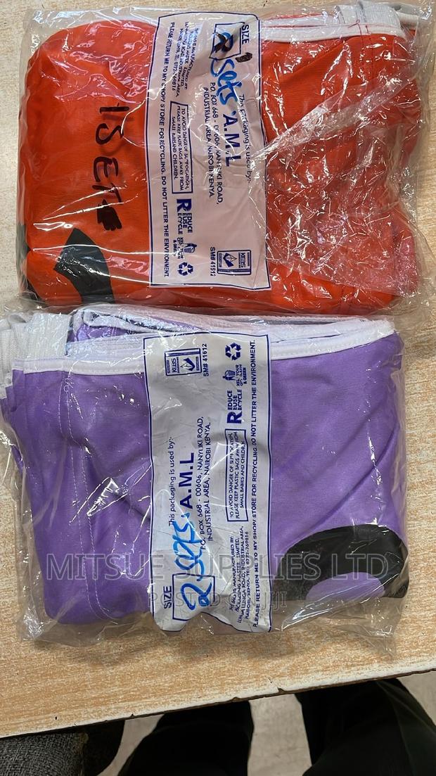 2 Sets of Netball Bibs Purple Orange. 7 Per Set