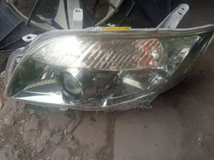 Fielder/Axio LHS Headlight Xenon