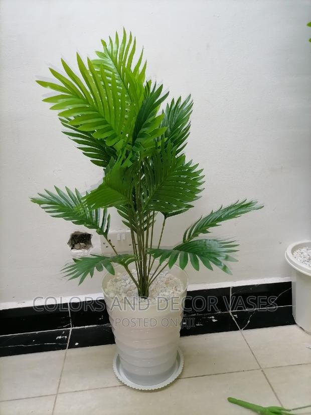 White Plastic Vase With Bottom Tray and Artificial Palm Tree