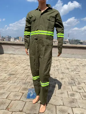 Green Overalls With Luminous Reflectors.