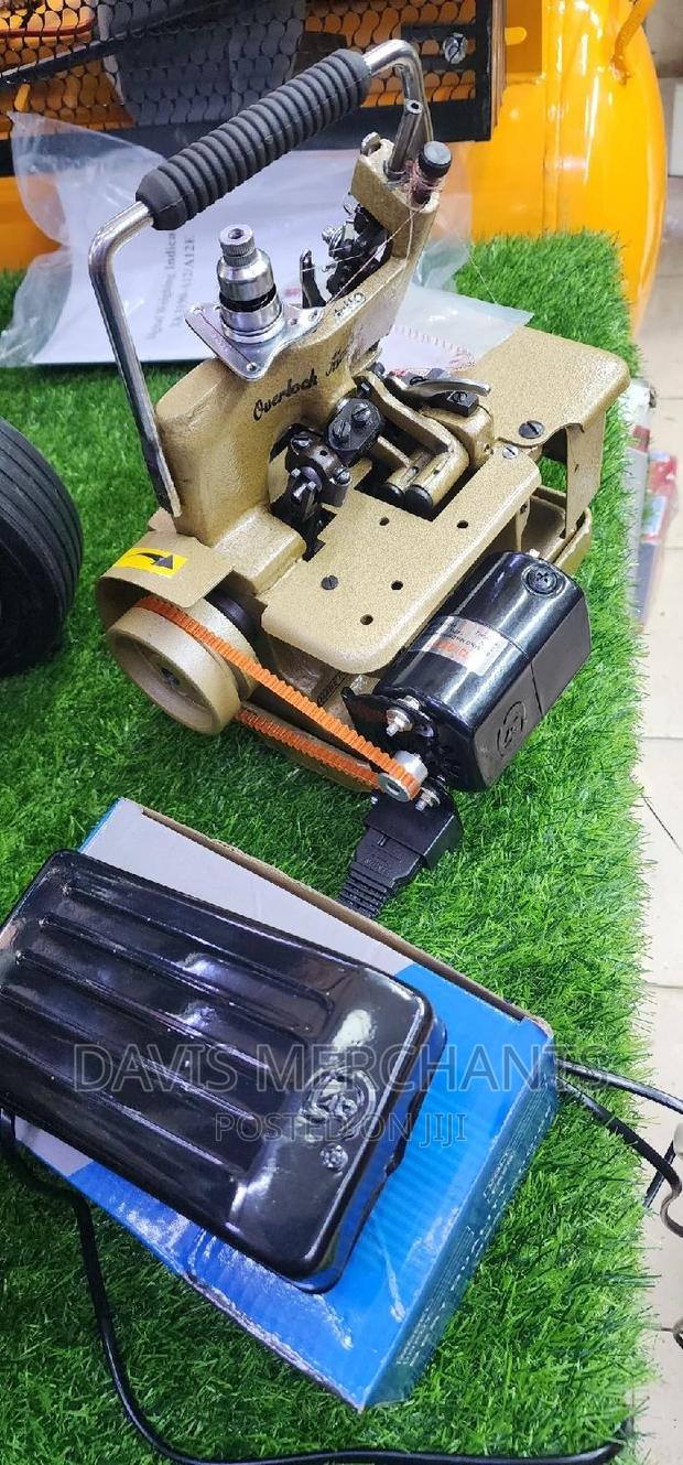 Overlock Machine Fitted With Motor and Clutch