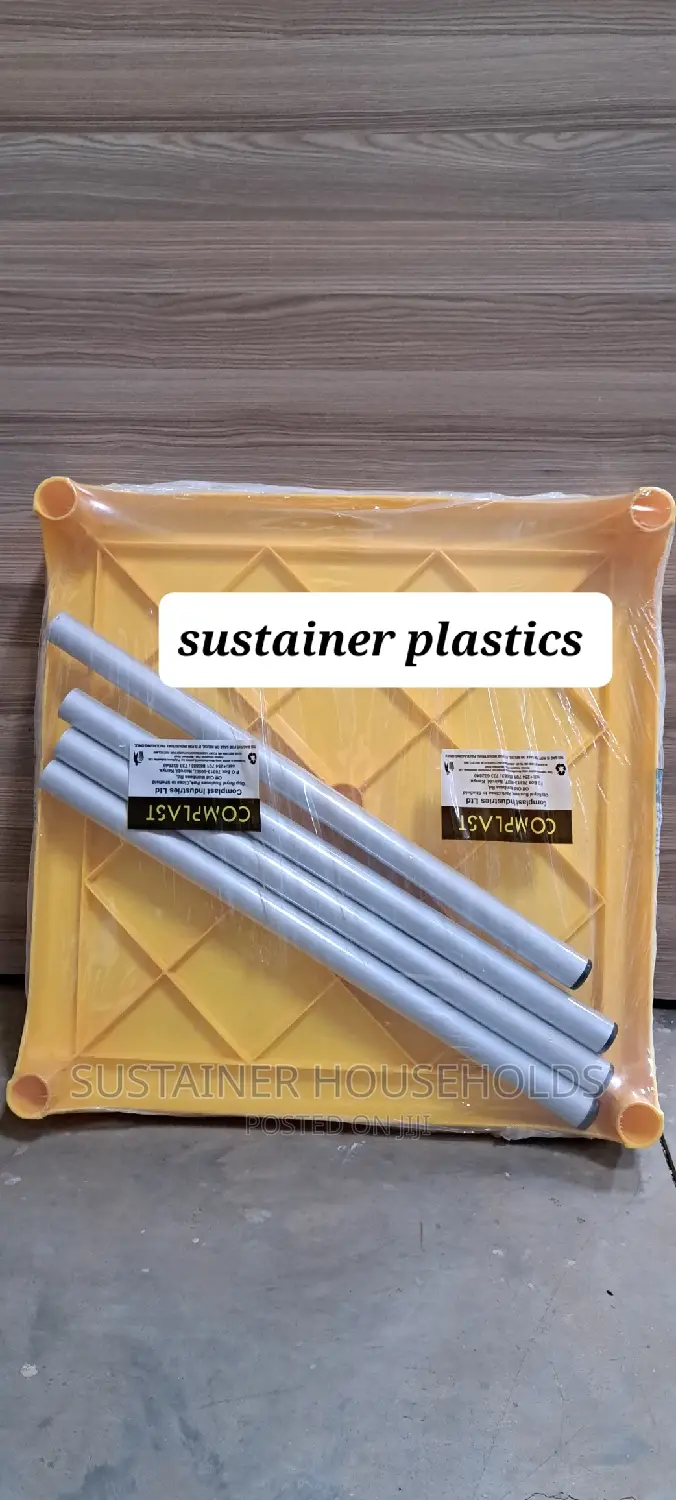 Yellow Plastic Table With Metal Tubing Legs