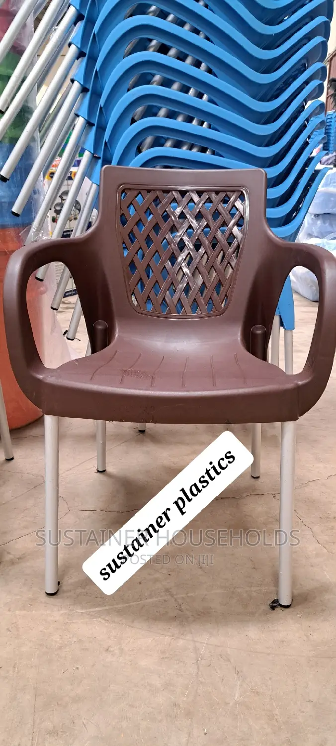 Brown Plastic Chairs With Metal Tubing Legs