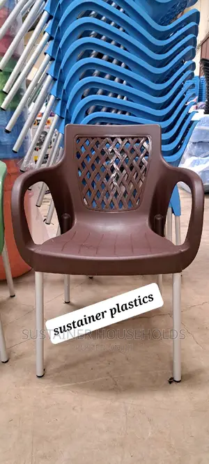 Brown Plastic Chairs With Metal Tubing Legs