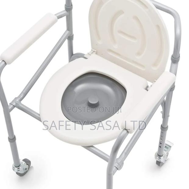 Foldable Commode Chair With Wheels - thumbnail 2