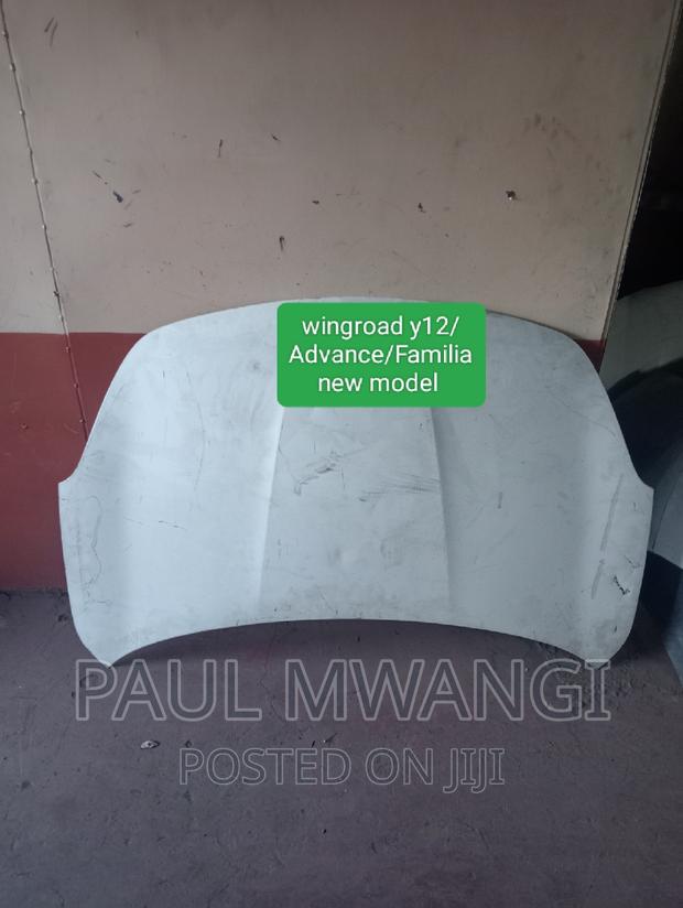 Bonnet Wingroad Y12 /AD/Mazda Familia