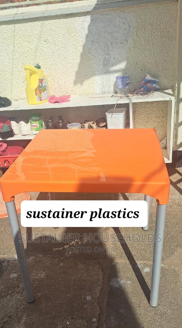 Square Orange Plastic Tables With Metal Legs Available - thumbnail 3