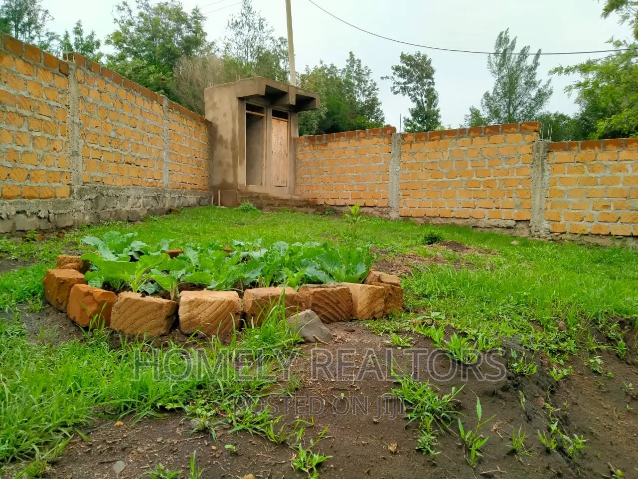 Half an Acre Land With a 3-Bedroom Bungalow in Kibiku, Ngong