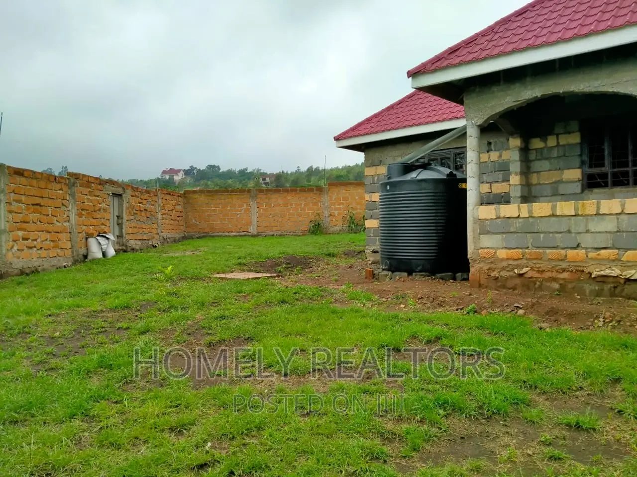 Half an Acre Land With a 3-Bedroom Bungalow in Kibiku, Ngong