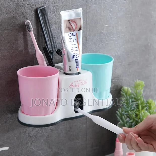 Toothbrush Holder And Toothpaste Dispenser With 2 Cups