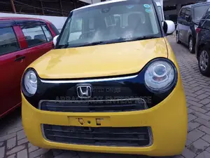 Yellow Honda N-One 2016: Stylish, Compact, and Budget-Friendly