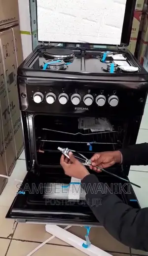 Bruhm Freestanding Cooker 3 Gas + 1 Hot Plate 60 by 60 Black