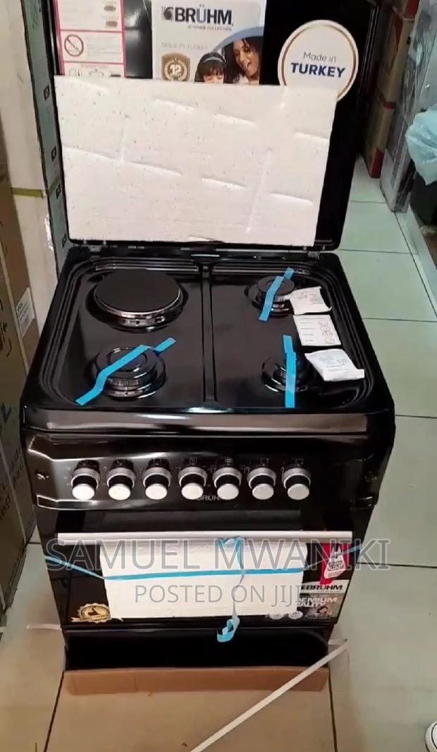 Bruhm Freestanding Cooker 3 Gas + 1 Hot Plate 60 by 60 Black