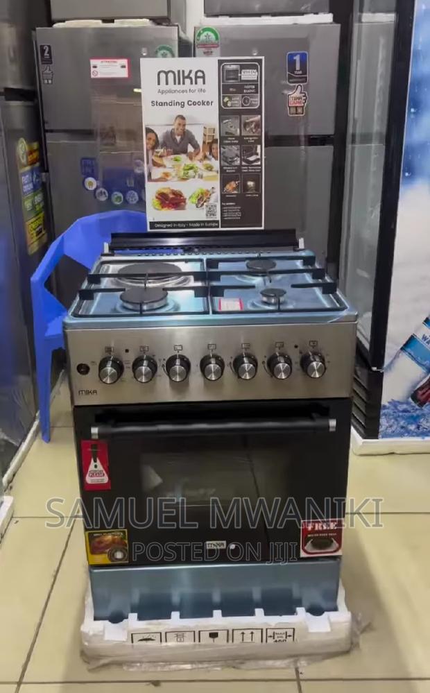 Mika Cooker 3 Gas + 1 Hotplate 60 by 60 Has an Electric Oven