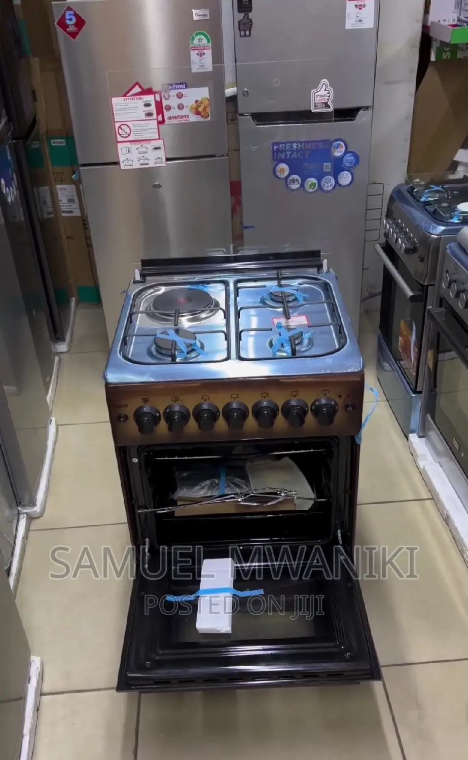 Mika Cooker 3 Gas + 1 Hot-Plate 60 by 60 With Electric Oven