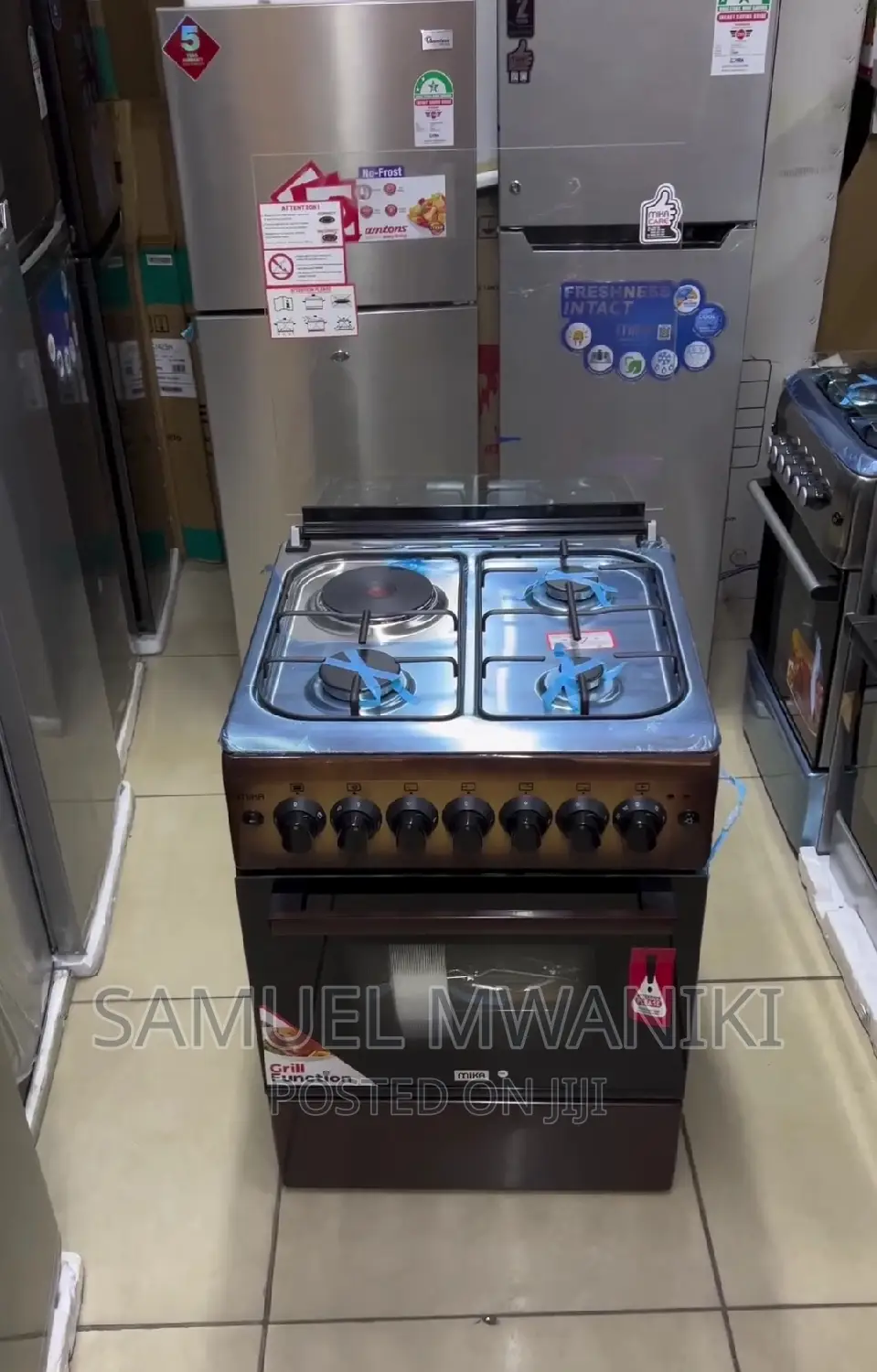 Mika Cooker 3 Gas + 1 Hot-Plate 60 by 60 With Electric Oven
