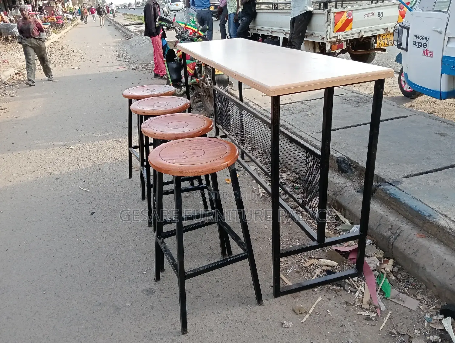 Four Mahogany Stools With One MDF Table